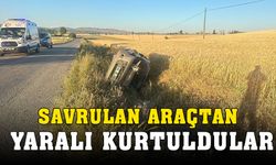 Şarampole devrilen otomobilden şans eseri yaralı kurtuldular