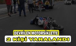 Devrilen motosiklette 2 kişi yaralandı   