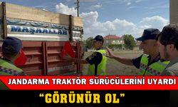 Jandarma traktör sürücülerine eğitim verip, reflektör dağıttı