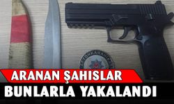 Aranan şahıslar tabanca ve bıçakla yakalandı