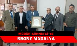 Müdür Sünnetci’ye bronz madalya