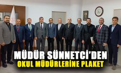 Müdür Sünnetci’den okul müdürlerine plaket