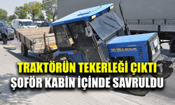 Traktörün tekerleği çıktı, şoför kabin içinde savruldu