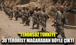 Silahlarını yakan 30 terörist mağaradan böyle çıktı