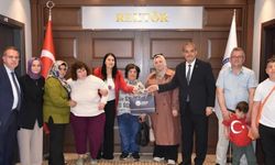 Rektör Aslan'dan anlamlı destek: Otizmli aileye verdiği sözü tuttu